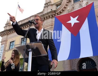 Miami, FL, USA. 17th July, 2021. Willy Chirino speaks as Cuban Americans show support for protestors in Cuba during the Rally For Democracy at the Freedom Tower on July 17, 2021 in Miami Florida. Credit: Mpi04/Media Punch/Alamy Live News Stock Photo