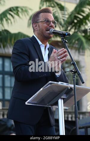 MIAMI, FL - JULY 17: Willy Chirino speaks as Cuban Americans show support for protestors in Cuba during the Rally For Democracy at the Freedom Tower on July 17, 2021 in Miami Florida. Credit: mpi04/MediaPunch Stock Photo