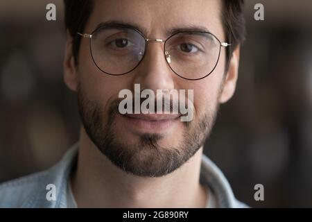 Portrait of handsome caucasian young 30s man in eyeglasses. Stock Photo