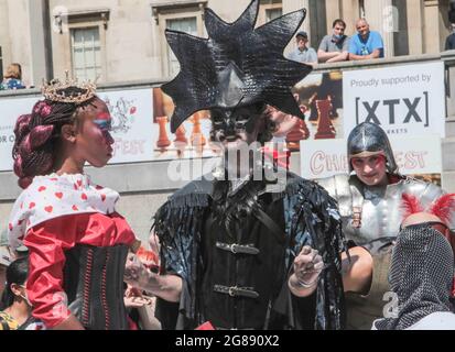 London 18 July 2021  Chess fest in Trafalgar Square, organized by the charity Chess in Schools and Communities, whose mission is to improve children’s educational outcomes and social development by introducing them to the game of chess. 32 actors the black queen and king  Paul Quezada-Neiman/Alamy Live News Stock Photo