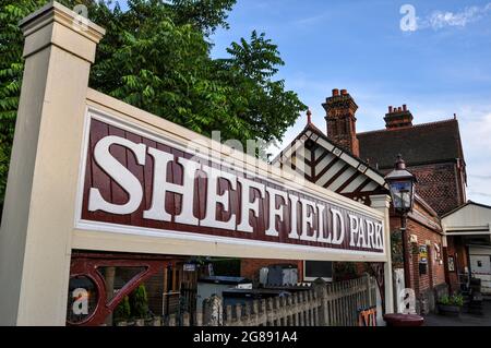 Sheffield Park railway station sign, the southern terminus of the Bluebell Railway and also the headquarters of the line. Preserved steam railway Stock Photo