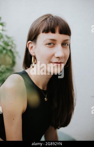 portrait of beautiful brunette woman smiling Stock Photo