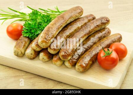 Ten Nuernberger sausages isolated against white background Stock Photo