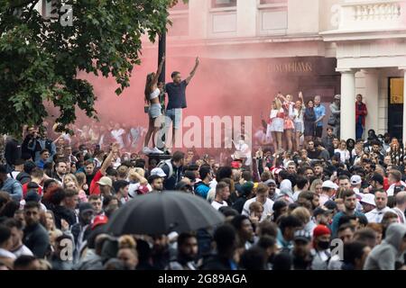 Crowd of English fans outside fan zone during the England vs Italy Euro 2020 final, Trafalgar Square, London, 11 July 2021 Stock Photo