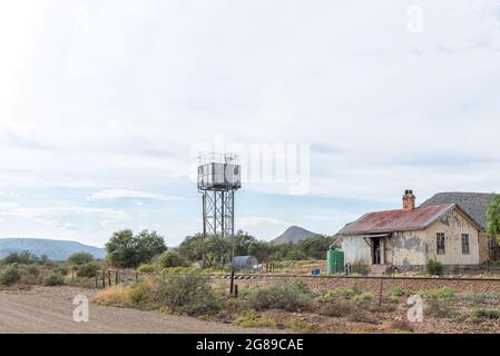 VONDELING, SOUTH AFRICA - APRIL 21, 2021: Old railway building and reservoir at Vondeling Railway Station on road R407 between Klaarstroom and Willowm Stock Photo