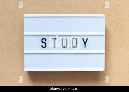 White lightbox with word study on wood background Stock Photo