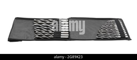 Set of metal drills in a black case isolated on white. Stock Photo