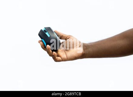 Wireless computer mouse in the hand on the isolated white background Stock Photo