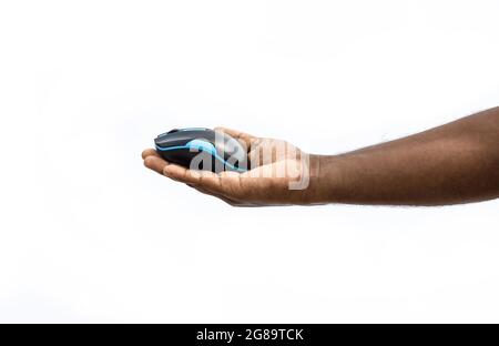 Colorful wireless computer mouse in the hand on the isolated white background Stock Photo