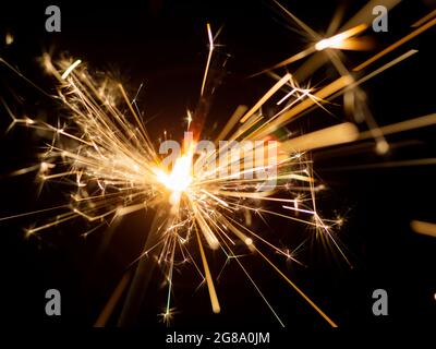 Fire sparklers on black background Stock Photo