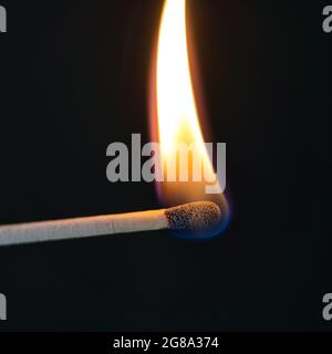 match is burning hot on black Stock Photo