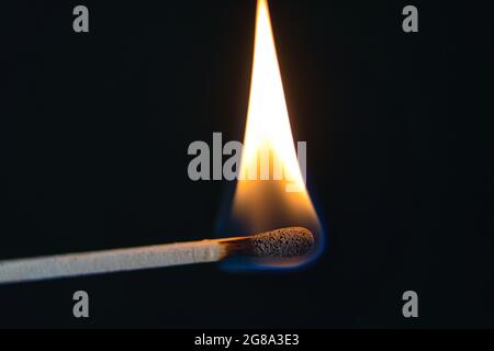 match is burning hot on black Stock Photo