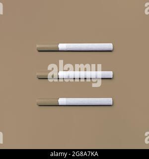 Photo of three cigarettes. Top view. Flat lay. Stock Photo