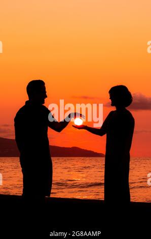 Couple sunset Stock Photos, Royalty Free Couple sunset Images |  Depositphotos