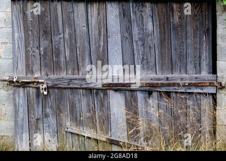 Wooden door of a barn Stock Photo