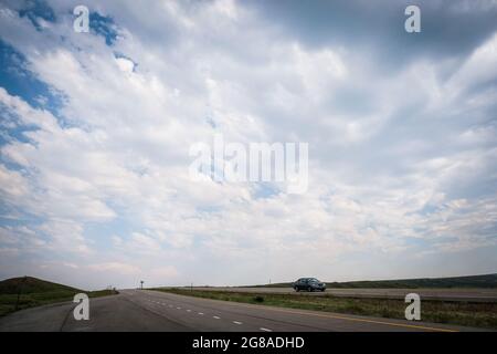 Car driving on US Interstate highway, Interstate 90, Wyoming, USA. Stock Photo