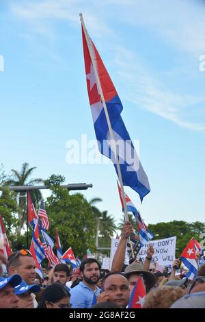 Cuba's President Miguel Diaz-Canel leaves a plane upon arrival at the ...