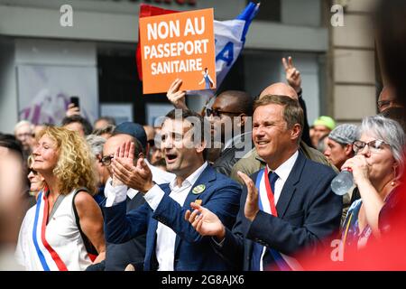 Paris, France. 17th July, 2021. Florian Philippot (l) and Nicolas Dupont-Aignan, president of Debout La France during the anti - sanitary pass demonstration at the initiative of Florian Philippot 's political party 'les patriotes » in Paris, France on July 17, 2021. Credit: Victor Joly/Alamy Live News Stock Photo