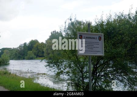 Warning against flood on river Limmat. The sign in Germany language says warning, the water level can rise suddenly and cause damages, keep away from Stock Photo