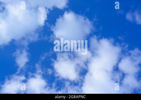 View of a blue sky with small light clouds, horizontal format Stock Photo