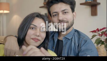Shallow focus of a young Indian couple kissing Stock Photo - Alamy