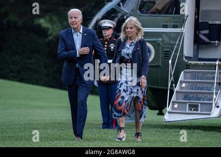 Washington, United States. 18th July, 2021. United States President Joe Biden and First Lady Jill Biden walk off of Marine One on the South Lawn of the White House in Washington, DC on Sunday, July 18, 2021. The Biden's spent the weekend in Camp David. Photo by Ken Cedeno/UPI Credit: UPI/Alamy Live News Stock Photo