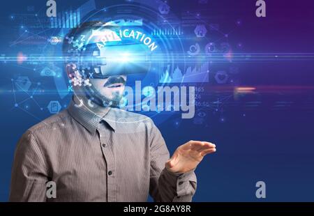 Businessman looking through VR glasses
