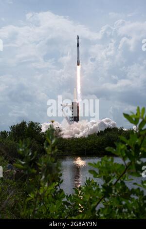 A SpaceX Falcon 9 rocket carrying the company's Crew Dragon spacecraft is launched from Launch Complex 39A on NASA’s SpaceX Demo-2 mission to the Inte