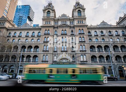 Vintage tram go through Spring Street with beautiful facade of the Hotel Windsor in the MELBOURNE, VICTORIA, AUSTRALIA Stock Photo