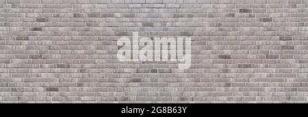 Panoramic brick wall background made of gray bricks Stock Photo