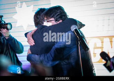 Santiago, Chile. 18th July, 2021. Gabriel Boric (RD) embraces and receives the support of Daniel Jadue (PC) after knowing the results. Gabriel Boric, the FA candidate, surpasses Jadue with more than one million votes and is elected as the presidential candidate of the left. Boric beat his communist rival Daniel Jadue by over 60%, who could not overcome the 40% barrier. Credit: SOPA Images Limited/Alamy Live News Stock Photo