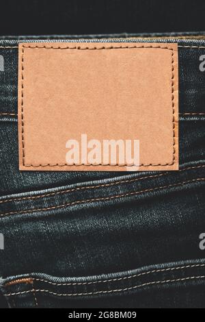 Blank leather label on new jeans trousers. Stock Photo