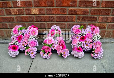 Funeral MAM tribute placed on of a coffin in the Hearst Stock Photo