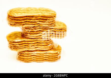 Cookies or crackers sealed in a cellophane blister for protection from viruses Stock Photo