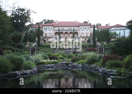 TULSA, UNITED STATES - Jun 25, 2021: The Philbrook Museum of Art is set in the historic home of Waite and Genevieve Phillips with expansive formal gar Stock Photo