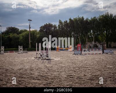 Saint Contest, France, Normandy July 2021. Empty obstacle course for horses, training area Stock Photo