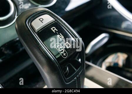 Automatic gearshift lever detail macro shot with selective focus Stock Photo