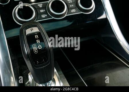 Automatic gearshift lever detail macro shot with selective focus Stock Photo