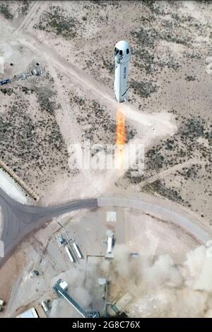 File photo showing Blue Origin's Mission NS-15 as it lifts off from Launch Site One in West Texas, on April 14, 2021. Blue Origin's New Shepard suborbital rocket remains on schedule to launch on its 16th flight to space and its first with astronauts on board on Tuesday, July 20, 2021, from Launch Site One, 160 miles east of El Paso, Texas. Founder Jeff Bezos will be accompanied aboard the flight by his brother Mark Bezos, 82-year-old aviator Wally Funk, and 18-year-old Oliver Daemen of the Netherlands. Funk and Daemen will become the oldest and youngest people to fly in space, respectively. Stock Photo