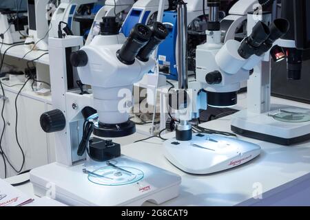 The latest microscopes on Exhibition of laboratory equipment Stock Photo