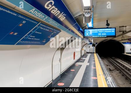 MADRID, SPAIN - Jul 16, 2021: Train platform on the Reopening of the modern Gran Via metro station in Madrid, Spain Stock Photo