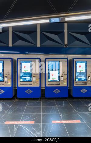 MADRID, SPAIN - Jul 16, 2021: Modern machines in the Reopening of the modern Gran Via metro station in Madrid, Spain Stock Photo