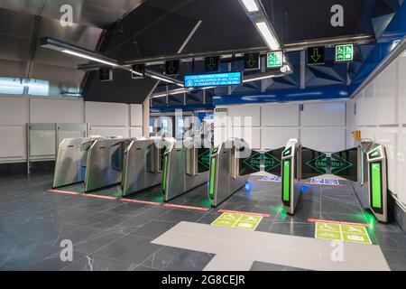 MADRID, SPAIN - Jul 16, 2021: Modern machines in the Reopening of the modern Gran Via metro station in Madrid, Spain Stock Photo