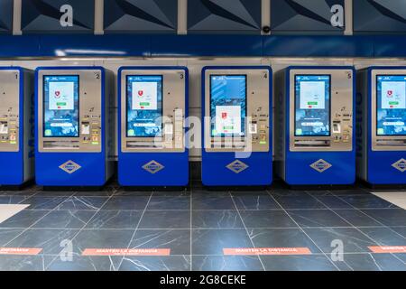 MADRID, SPAIN - Jul 16, 2021: Modern machines in the Reopening of the modern Gran Via metro station in Madrid, Spain Stock Photo