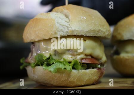 X-Salada. Brazilian hamburger made in barbecue grill. Stock Photo