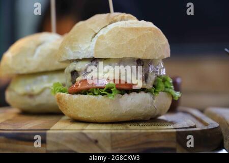 X-Salada. Brazilian hamburger made in barbecue grill. Stock Photo