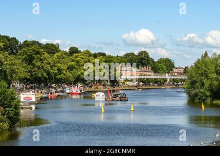 Chester, England - July 2021: Scenic view of boats on the River Dee, which flows through the city. Stock Photo