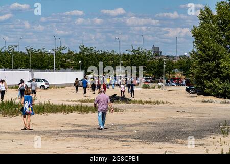 MADRID, SPAIN - Jul 07, 2021: The long lines to get vaccinated against Covid-19 outside the nurse Isabel Zendal of Valdebebas hospital Stock Photo