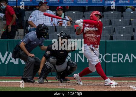 Mexico City, Mexico, July 18, 2021: Jesus Fabela #36 of the Diablos Rojos  catches the ball during the match between Diablos Rojos and Monclova  Acereros of the Mexican Baseball League at Alfredo
