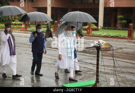 New Delhi, India. 19th July, 2021. Indian Prime Minister, Narendra Modi arrives to speak to the media on the first day of the Monsoon Session of Parliament 2021 at the Parliament House.The sixth session of the 17th Lok Sabha start from 19th July 2021 to August 13, 2021 following Covid-19 protocols. Over 400 Members of Parliament and over 200 staff have already been vaccinated ahead of the Monsoon session though both house (Lok Sabha and Rajya Sabha). Credit: SOPA Images Limited/Alamy Live News Stock Photo